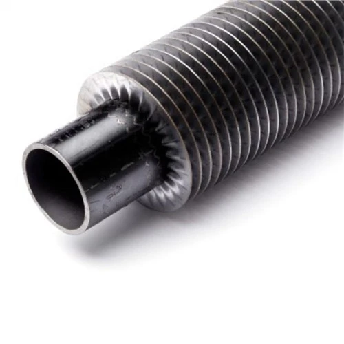 Tube à ailettes dentelé